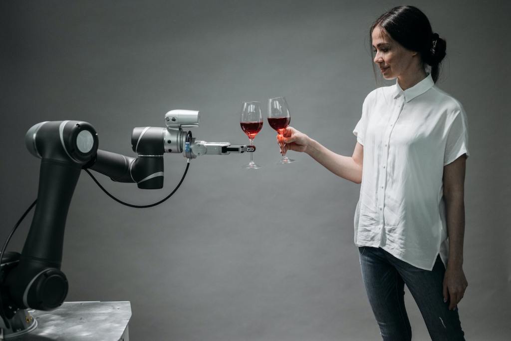machine learning robot cheers red wine with human demonstrating computer vision and artificial intelligence